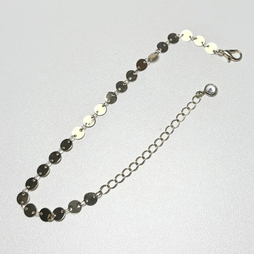 Gold Tone Flat Disc Sequin Chain Bracelet with Crystal Extender Charm